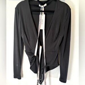 House of CB. Size S. New with tags. Black long sleeve bodysuit. Low in front.